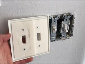Photo image of light switch plate gasket for air sealing