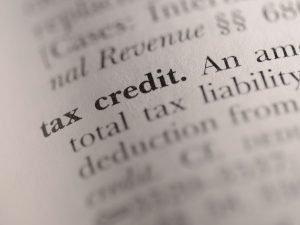 Closeup photo of a page of print with the words "tax credit" highlighted