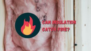 A picture of fiberglass insulation in a wall, with a fire symbol over top of it, and the words Can Insulation Catch Fire written to the right side.