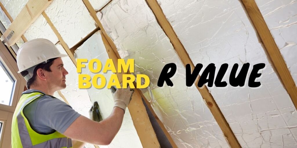 a man in a hardhat and yellow safety vest installing rigid foam board insulation in the wall.