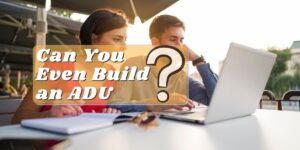A couple looking at a laptop with the words Can You Even Build an ADU? across the middle