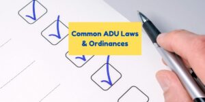 Hand with a pen marking off a checklist with the caption "Common ADU Laws and Ordinances"