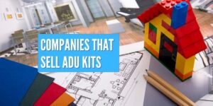 architectural drawings on a small adu kit build with a little house sitting on the table