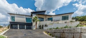 Exterior front facing view of a green home in Texas