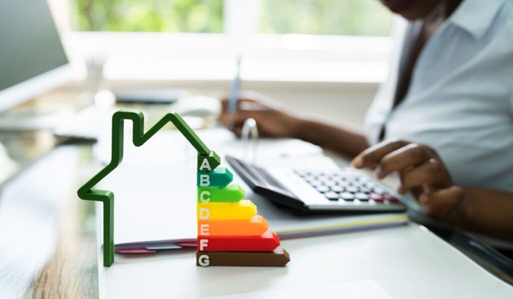 An energy audit is performed using a calculator and computer