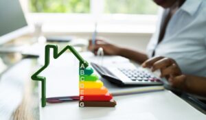 An energy audit is performed using a calculator and computer