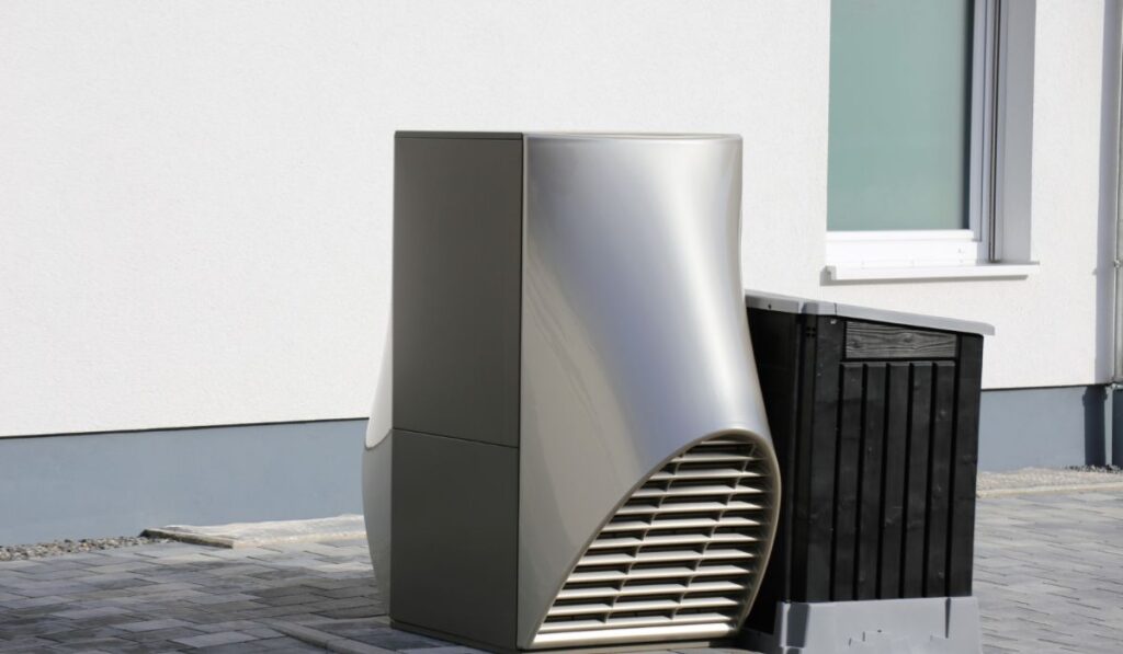 An air source heat pump outside a home
