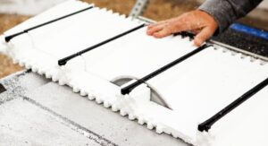 ICF is cut to size on a table saw
