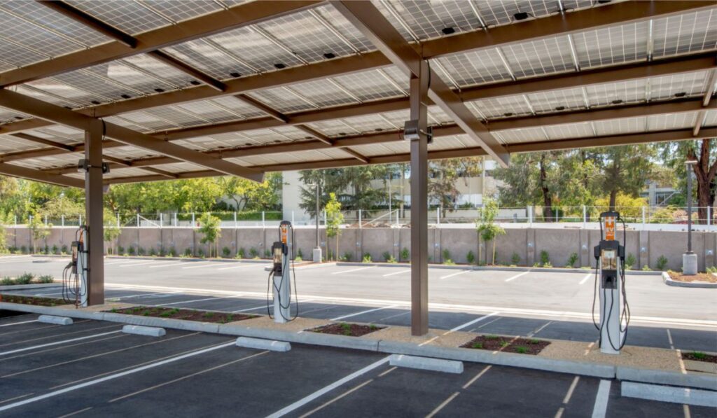 Stalls of a solar power electric vehicle charging station are displayed