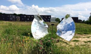 A full solar cooker setup in a field