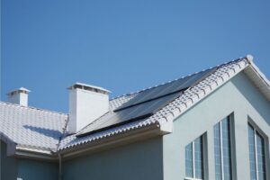 The roof of a passive house with solar panels installed