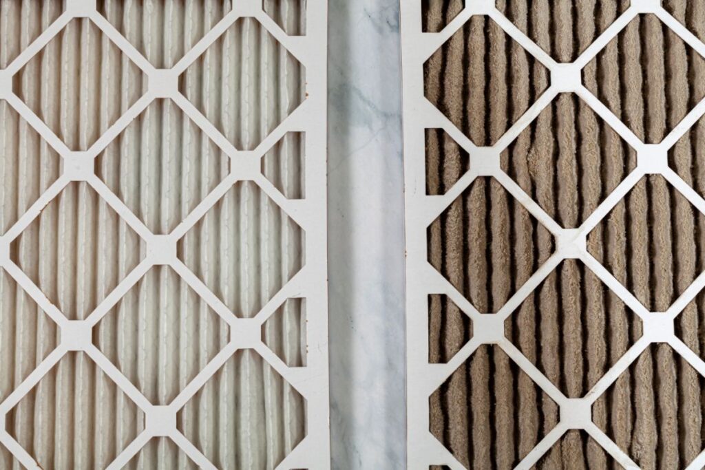 A closeup on two furnace filters side-by-side