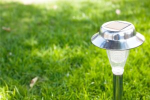 Closeup of a solar lamp in a yard