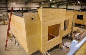 A modular home being fabricated in a factory
