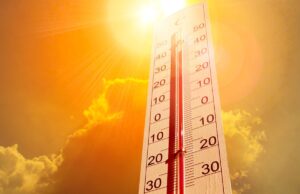A thermometer superimposed in front of the Sun