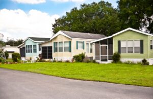 A row of modular homes with the street in the foreground