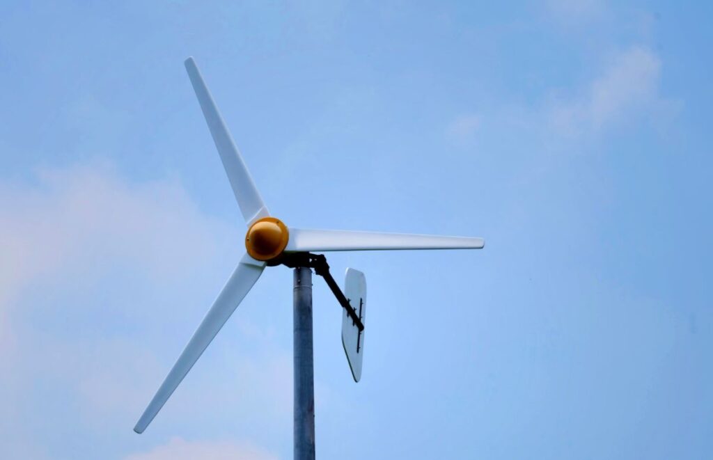Closeup on the motor and blades of a small wind turbine