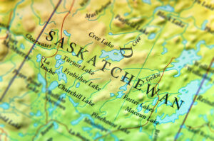 a top down view of a green and yellow saskatchewan map in canada