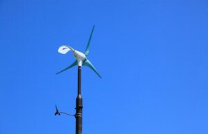 Closeup on a small home wind turbine from behind