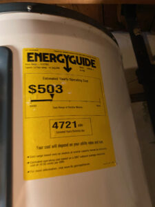and old water heater energuide label that says $503 per year in electricity