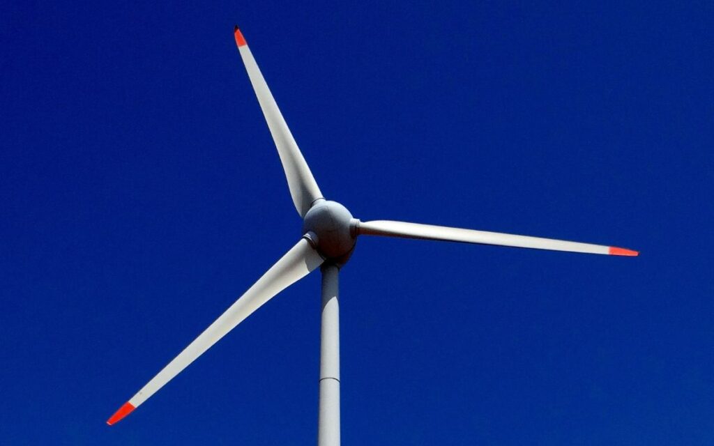 Closeup on the blades and hub of a small wind turbine