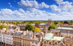 Skyline of a city in England with a mix of historical and contemporary buildings.