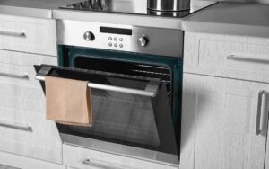 An all-electric home's kitchen and it appliances, including induction stovetop and electric oven