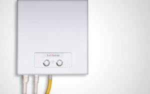 closeup on the bottom and cables connected to a gas tankless water heater