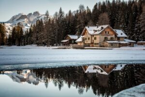 A passive solar winter lake home on the edge of a forest