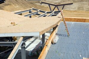 A SIP roof panel laid on the attic framing of a home under construction