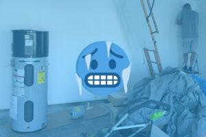 a heat pump water heat on the left with a man installing the piping on the right, with a emoji cold face symbol in the middle