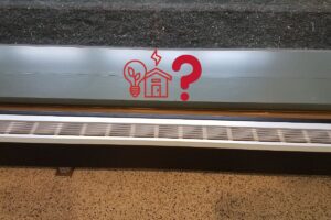 a baseboard heater with its cover off