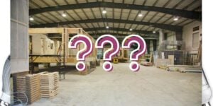A modular home builder's climate-controlled factory with the text "???" superimposed above the image