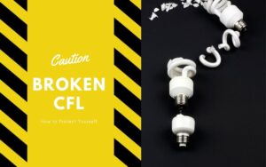 a broken cfl with yellow and black caution tape around the picture