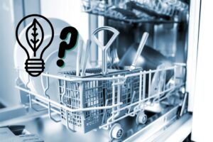 The bottom rack of a half-empty open dishwasher