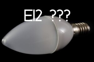 An E12 light bulb on its side with the text "e12 ???" superimposed above it